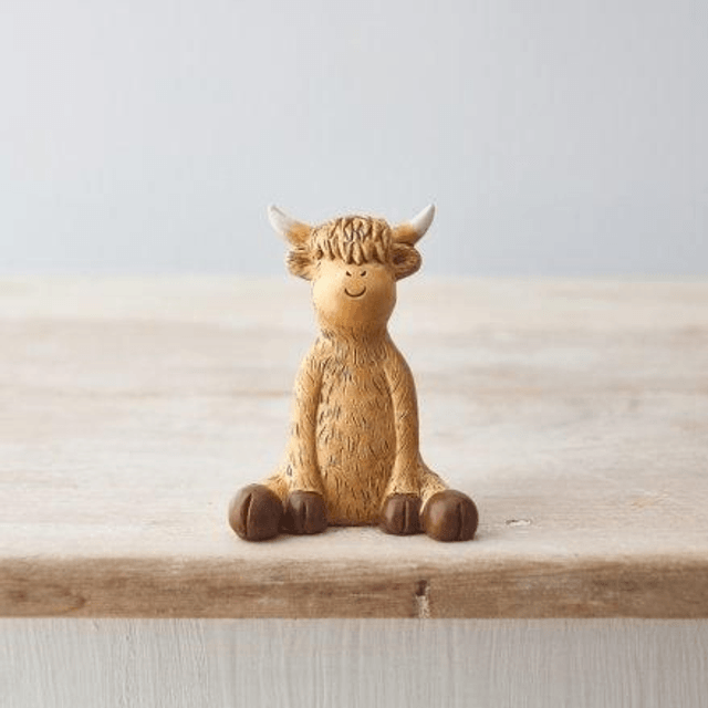Sitting Highland Cow Ornament 